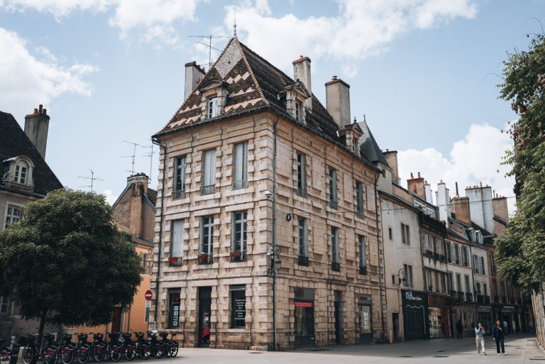 This is a large stone building at 2 Rue Victor Dumay. It has a glazed title roof and is one of the most unique buildings on the street.