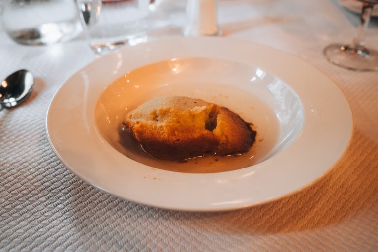 This is the Baba Lorraine that I ate at Le Bouillon Rousselet in Nancy. It's a madeleine soaked in rum in a round dish.