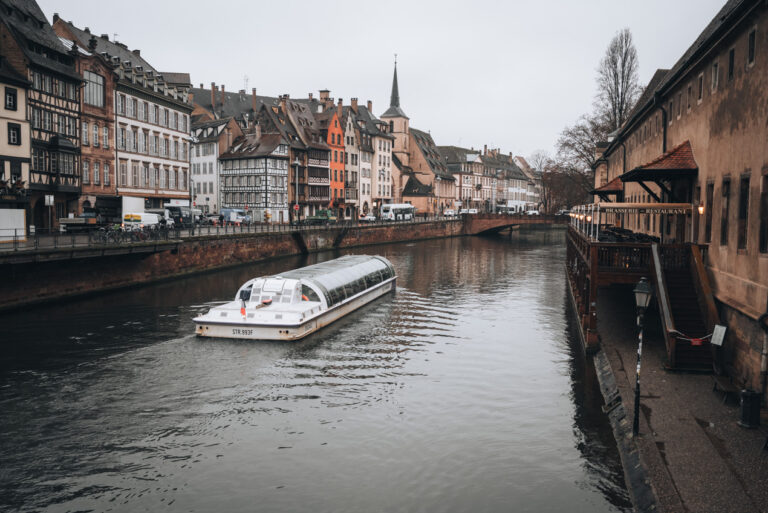 A Batorama Boat floating along the Ill River in Strasbourg on a cold winter day. This is a great activity to do when it's cold outside.