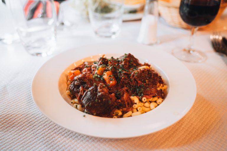 This is the Beef Bourguignon I ate at Le Bouillon Rousselet in Nancy. It's a round plate with beef and sauce on top of pasta.