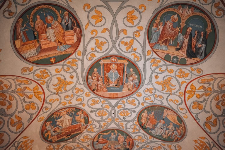 This is the ceiling inside the Chapelle Saint-Léon IX in Eguisheim. It shows the life of Chapelle Saint-Léon IX in a series of paintings.