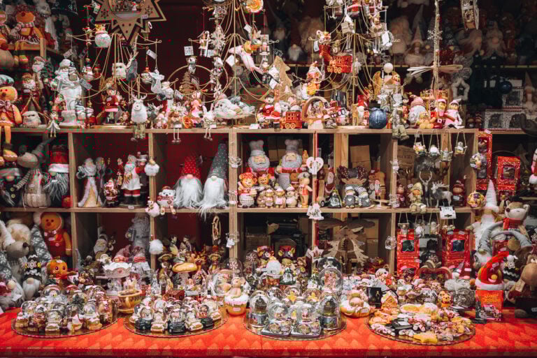 These is a Christmas market stall in Colmar selling Christmas ornaments and snow globes.