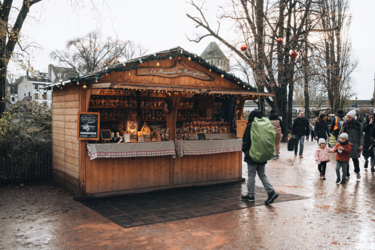 Wooden chalet selling handmade crafts at the Christmas market in the Louise Weiss Square in Strasbourg.