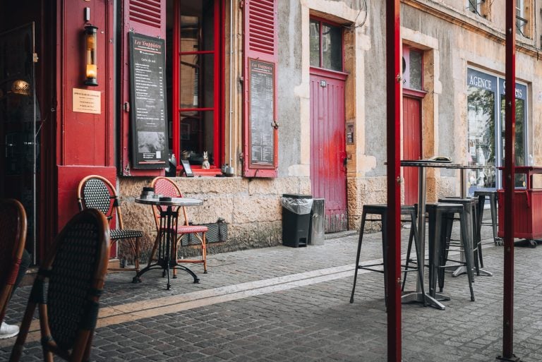 This is Les Trappistes in Metz on a Saturday afternoon in June. There are two tables with two chairs and the place is empty.