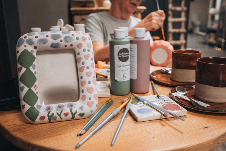 This is a picture frame that was painted by Jen Ciesielski at the ceramic cafe called La Boutique des Bouleaux when it was raining outside in Strasbourg.
