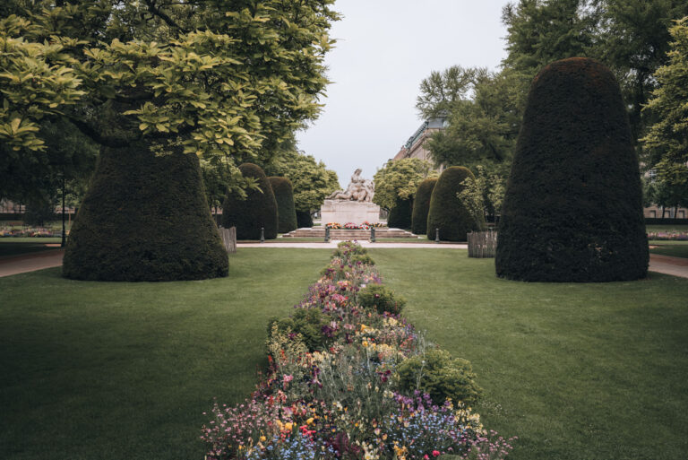 A bed of flowers lead to the monument aux morts in Place de Républque in Strasbourg. This square is a symbol of peace and prosperity between France and Germany.  