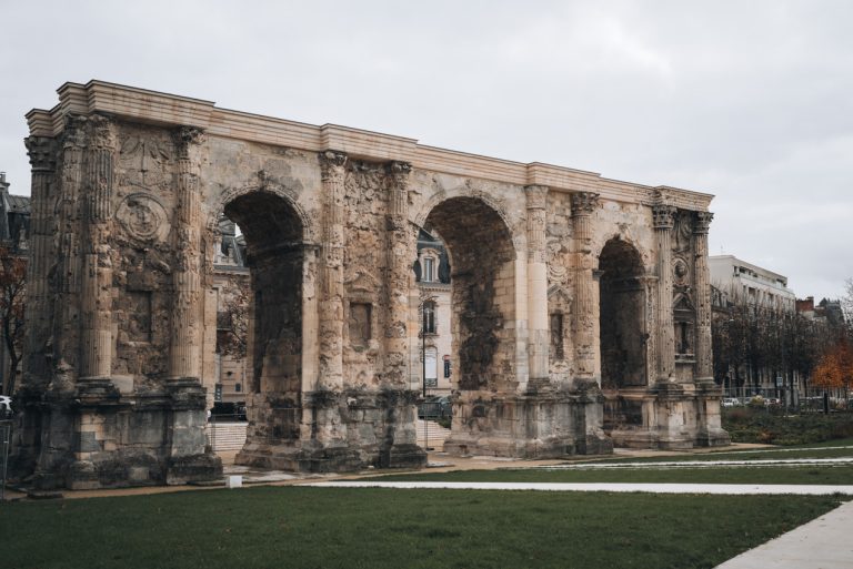 The is the Porte de Mars in Reims. It's a large stone gate with three openings. It's also free to visit.