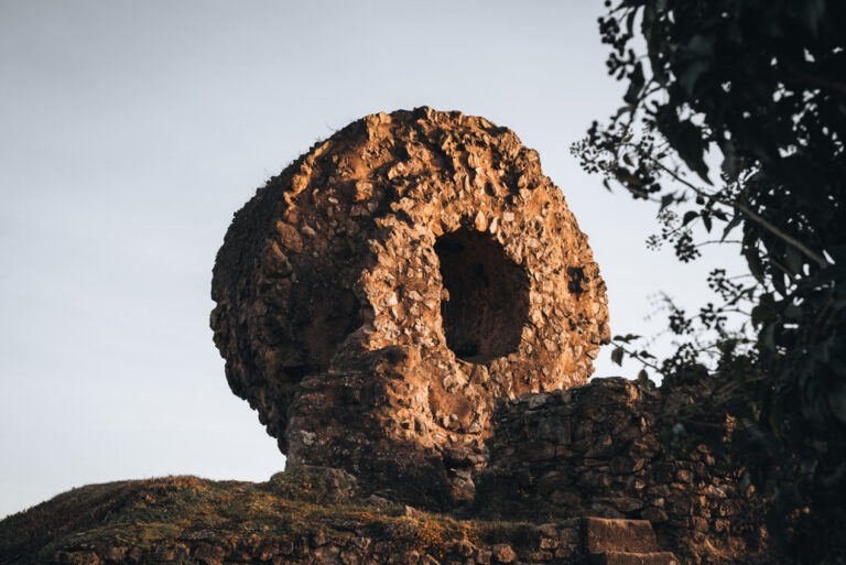 The Sorcerer's Eye from the Château d'Engelbourg sitting on the castle ruins and illuminated by the setting sun.