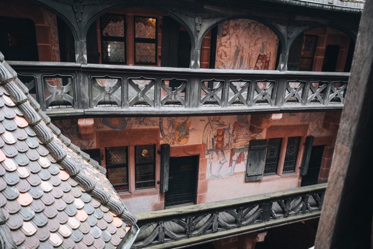 These are the upper terraces in the inner courtyard of the Haut Koenigsbourg Castle. They are made of wood and their are paintings on the walls.