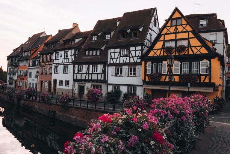 This is Little Venice in Colmar. There are several half-timbered houses in a row and they are all different colors. It's one of the best areas to stay in Colmar.